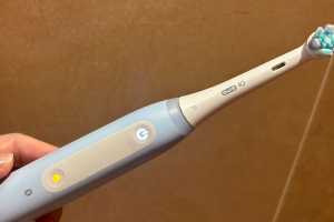 Has your Oral-B iO button lit up in yellow? Here's how to fix it