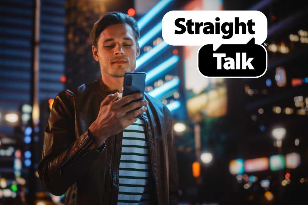 Man,Using,Smartphone,Walking,Through,Night,City,Street,Full,Of